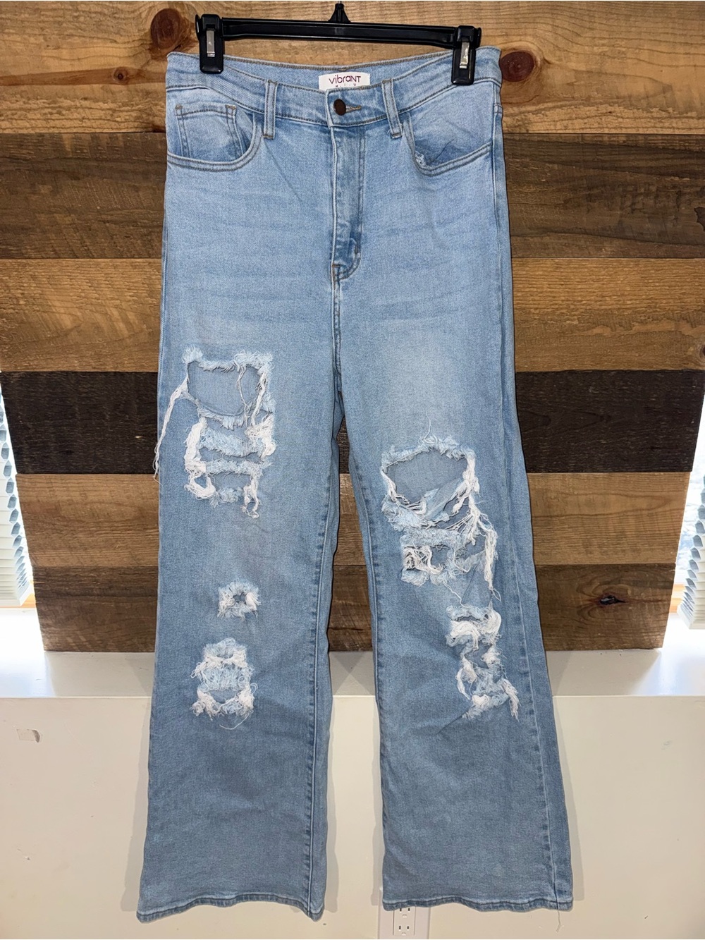 Vibrant Light Blue Distressed Denim Jeans